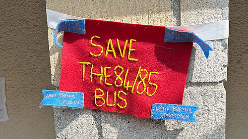 84/85 Bus Campaign banner