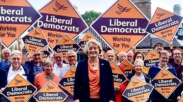 Claire with a crowd of Lib Dem Campaigners